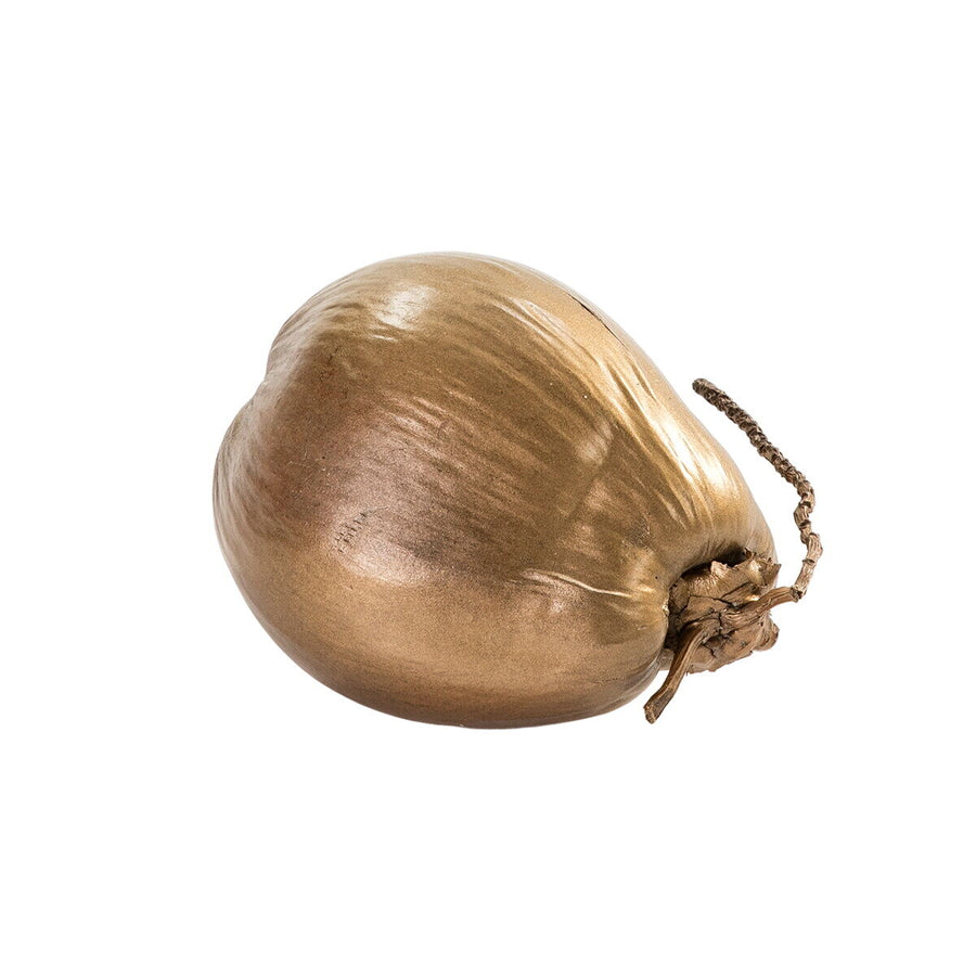 Gold-finished coconut ornament lying on its side with a short twisted stem